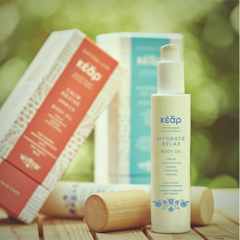 Kear Hydrate Relax natural Body Oil, multipurpose, chemical free, cruelty free. With olive oil, almond oil, beeswax, chamomile, rosemary. Restores moisture balance and calms dry and irritated skin.